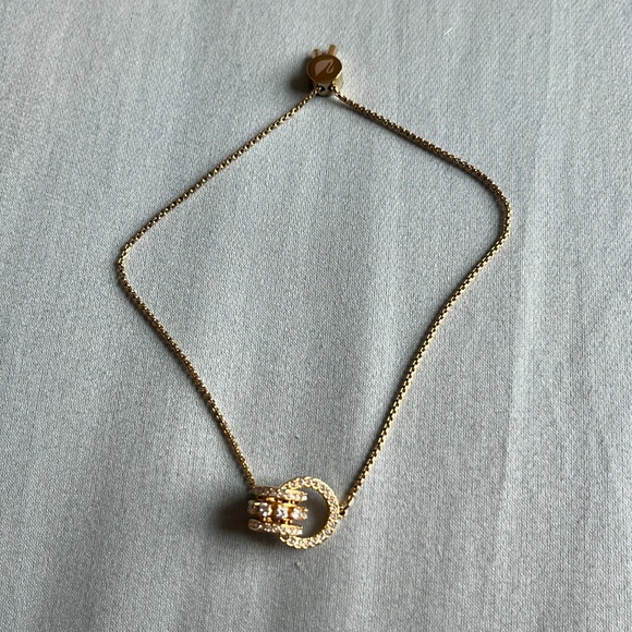 Swarovski adjustable gold bracelet with interlocking hoops - Picture 1 of 3